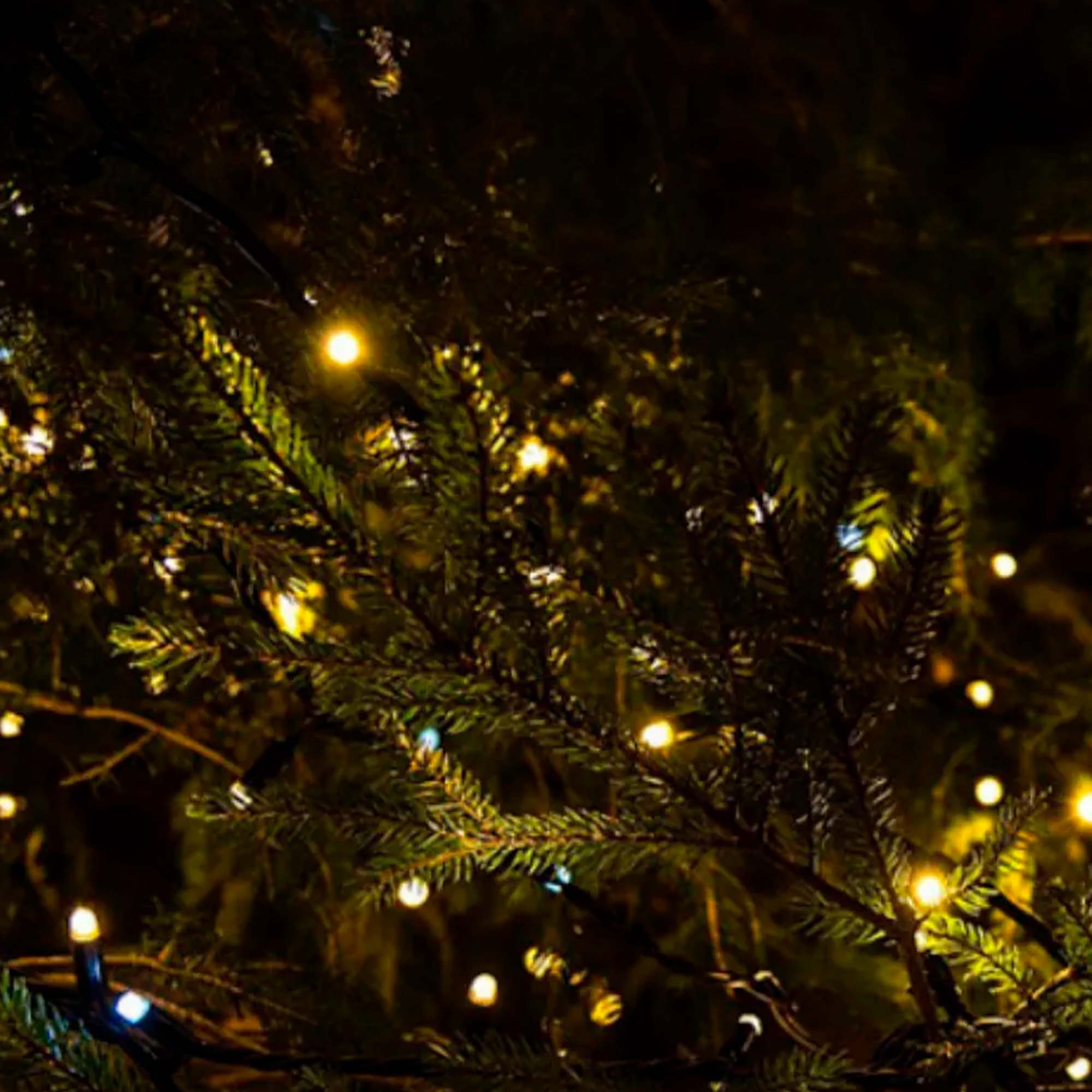 Гирлянда "Нить" 10м, темная нить, свечение желтое теплое РД18270