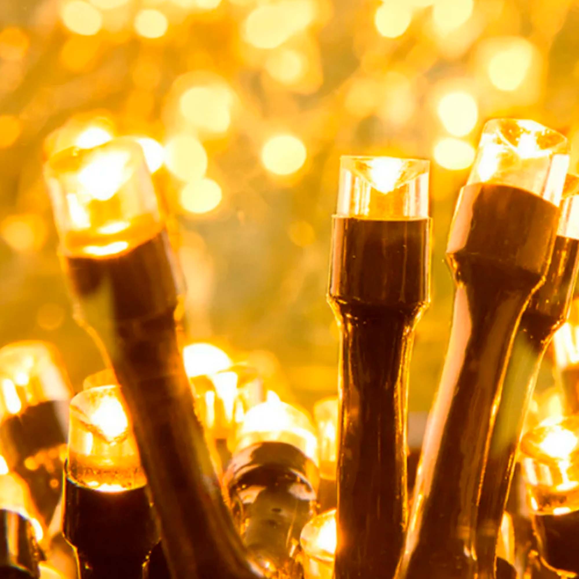 Гирлянда "Нить" 10м, темная нить, свечение желтое теплое РД18270