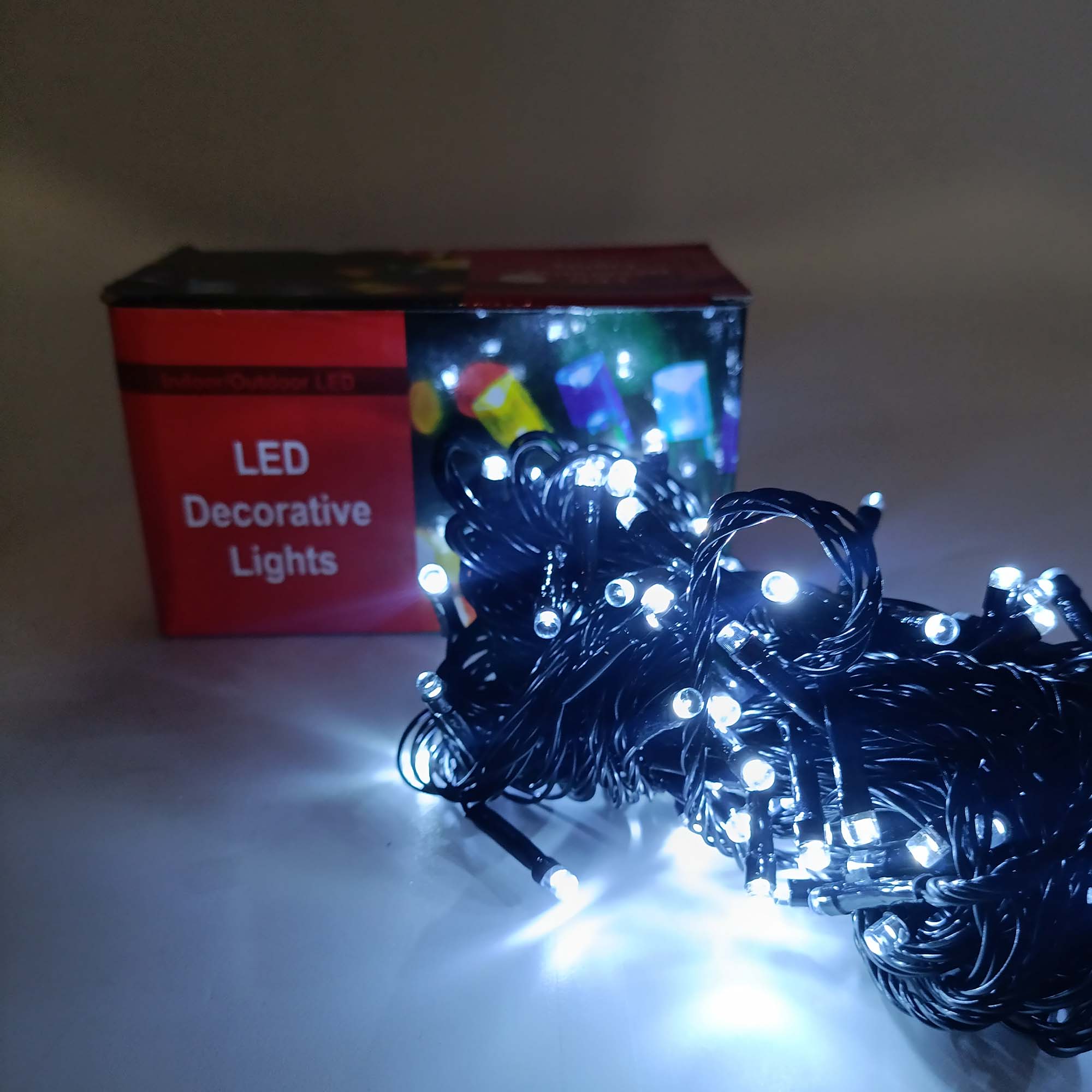 Гирлянда "Нить" 10м, темная нить,свечение белое холодное РД18294